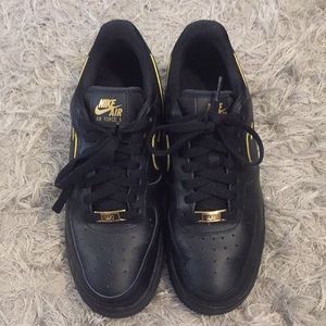 black & gold nike air force 1s